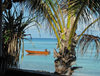 Funafuti atoll, Tuvalu: view of the lagoon side - boat and palm trees - photo by G.Frysinger