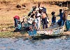Uganda - Queen Elizabeth National park: Kazinga channel - the ferrymen (photo by Nacho Cabana)