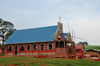 Lugazi, Buikwe District, Uganda: workers building a new church- photo by M.Torres