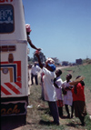 Uganda - selling goods to passengers on a bus - photos of Africa by F.Rigaud