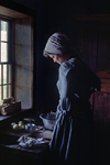 Kettle Moraine State Forest, Wisconsin, USA: Old World Wisconsin - pioneer woman baking apple pie in a historic settler cabin - photo by C.Lovell