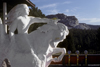 Custer, South Dakota, USA: model of the the Crazy Horse Memorial with the mountain in the background - Crazy Horse was an Oglala Lakota chief and resistance leader - photo by C.Lovell