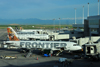 Denver, Colorado, USA: Denver International Airport - Frontier Airlines aircraft at Concourse A with the Rocky Mountains in the background - Airbus A320-214 N201FR Caribou 'Yukon' cn3389 - photo by M.Torres