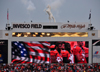Denver, Colorado, USA: Invesco Field at Mile High football stadium - rendition of the national anthem 'The Star-Spangled Banner' - Broncos' players facing the flag with the right hand over the heart - stadium screen - photo by M.Torres