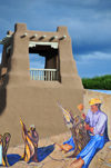 Taos, New Mexico, USA: Trompe l'Oeil painting over adobe tower - Taos Plaza - photo by M.Torres
