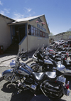 Madrid, Santa Fe County, New Mexico,USA: Harley Davidson motorcycles parked at the Mine Shaft Tavern on route 14, south of Santa F - photo by C.Lovell