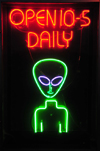 Roswell, Chaves County, New Mexico, US: neon alien on Main Street - entrance to the UFO 'Museum' - photo by M.Torres