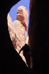 Arches National Park, Utah, USA: Fiery Furnace - climber's silhouette on a narrow passage - photo by B.Cain