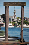 Portsmouth, New Hampshire, USA: portico for hanging big game fish - tug boats pier, Ceres St - Badgers Island, ME in the background - New England - photo by M.Torres
