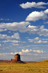 Monument Valley, Navajo Nation, Arizona, USA: isolated mitten shaped butte framed by scenic clouds - photo by M.Torres