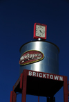 Oklahoma City, OK, USA: Bricktown - Dr. Pepper Tower - metal water tower against the sky - notice the mobile phone antennas on the legs - photo by M.Torres