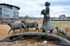 Little Rock, Arkansas, USA: 'sculpture Homeward Bound' - Navajo girl crosses a bridge with a gift of animals - reflective of the hope and self-reliance - Heifer International headquarters - artist Allan Houser - photo by M.Torres
