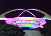 Los Angeles, California, USA: LAX, Los Angeles International Airport at night - the two crossed arches of the flying saucer Theme Building - Mid-century modern style by William Pereira and Charles Luckman - photo by M.Torres