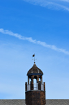 Narragansett Pier, Washington County, Rhode Island, USA: The Towers - observation turret with weathervane against sky with contrails - Ocean road - the only remnant of the Narragansett Pier Casino built in the 1880s -  Victorian Shingle style architecture - architects McKim, Mead, and White - photo by M.Torres