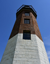 Point Judith, Narragansett, Rhode Island: Point Judith Lighthouse - entrance to Narragansett Bay - octagonal granite tower - famous for the loss at sea of the German Kriegsmarine's U-853 with all its crew - photo by M.Torres