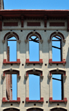 Louisville, Kentucky, USA:preserved facade of a demolished building - sky seen through the windows - main street - photo by M.Torres