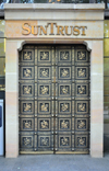 Charlotte, North Carolina, USA: SunTrust building - bas-relief decorated door - photo by M.Torres