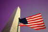 Washington D.C., USA: Washington monument - flag and purple sky - patriotic image - photo by G.Friedman