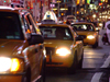 Manhattan (New York City): yellow cabs at Times Square - nocturnal - photo by M.Bergsma