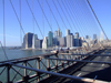 New York City: Brooklyn Bridge - cables and the city - photo by M.Bergsma