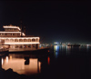 San Diego (California): Night view of San Diego Bay with a floating restaurant - photo by J.Fekete