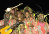 Vanuatu - Band members drinking beer, Ambrym Island - photo by B.Cain