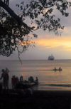 Vanuatu - People boardingzodiac at sunset with ship, Ambrym Island - photo by B.Cain