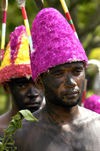 Vanuatu Two men dancerswith colored hats, Loh Island - photo by B.Cain