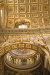 Vatican City, Rome - inside Saint Peters Basilica - ceiling of the nave and a side chapel - photo by I.Middleton