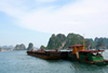 Halong Bay - vietnam: a barge on the move - photo by Tran Thai