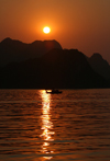 Halong Bay - vietnam: sunset and fishing boat - photo by Tran Thai