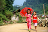 Ba Be National Park - vietnam: cute girls with umbrella - photo by Tran Thai