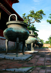Hue - vietnam: Nine dynastic urns in front of the The Mieu, the Temple of Generations - Hue citadel - photo by Tran Thai