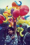 Child selling ballons (photo by Joe Filshie)