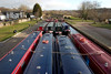 Llangollen, Denbighshire / Sir Ddinbych, Wales, UK: canal longboats lined up waiting for tour duty - photo by I.Middleton