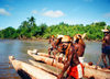 West Papua / Irian Jaya - Syuru village: dugout canoes and crew - photo by G.Frysinger