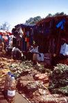 Guinea Bissau / Guin Bissau - Bissau: the market - people and products / o mercado, garrafas de gua Vitalis (foto de / photo by Dolores CM)